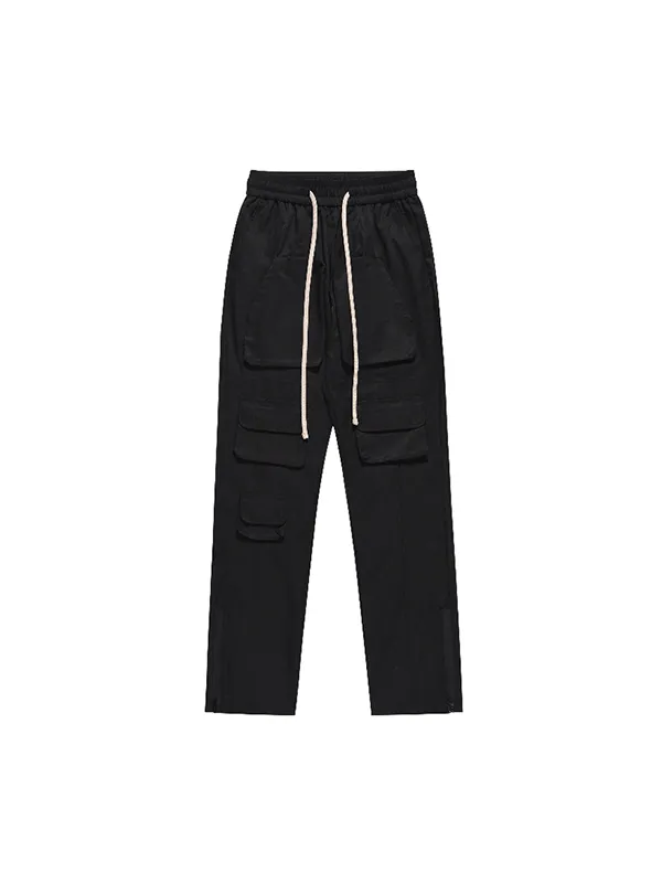 Pantalones cargo negros con cremallera lateral y múltiples bolsillos para hombre