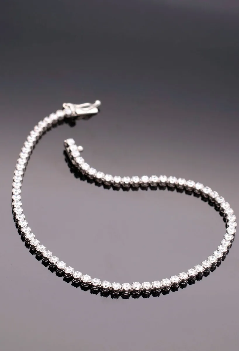 PULSERA DE ORO BLANCO 18K CON CIRCONITAS. 243_34900312