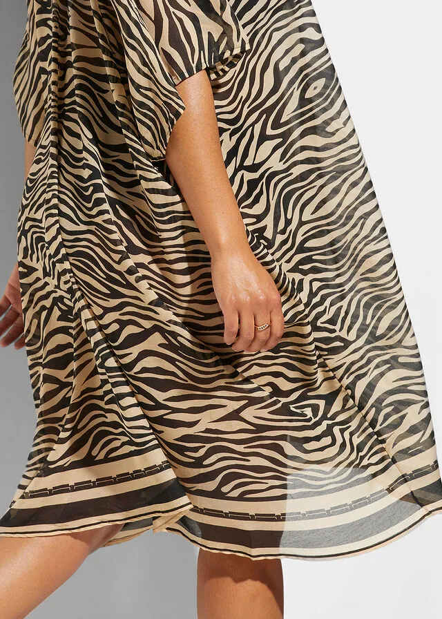 VESTIDO NEGROBEIGE CON ESTAMPADO DE CEBRA